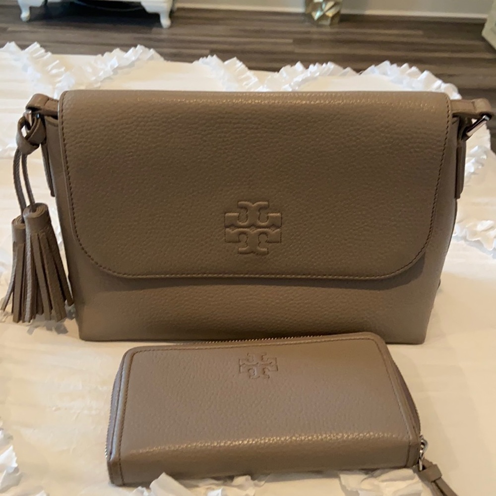 Tory Burch gray cross body with matching wallet.